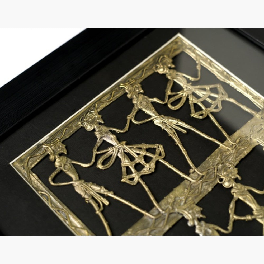Angled close-up of Nritya Square brass wall frame in Bastar Dokra art showing handcrafted dancing figures, black finish 12.5 inch decor