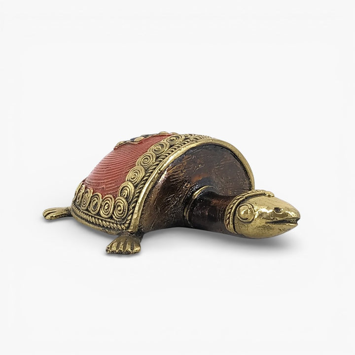 Red enamel tortoise décor bell metal front perspective