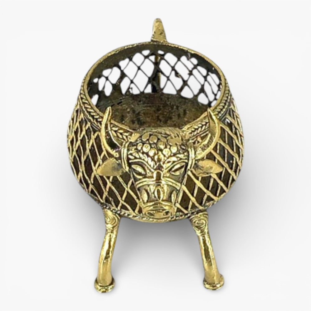 Handcrafted bell metal cow design pen holder top front view