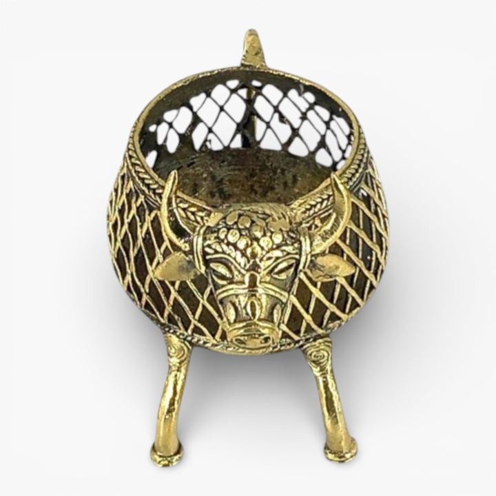 Handcrafted bell metal cow design pen holder top front view