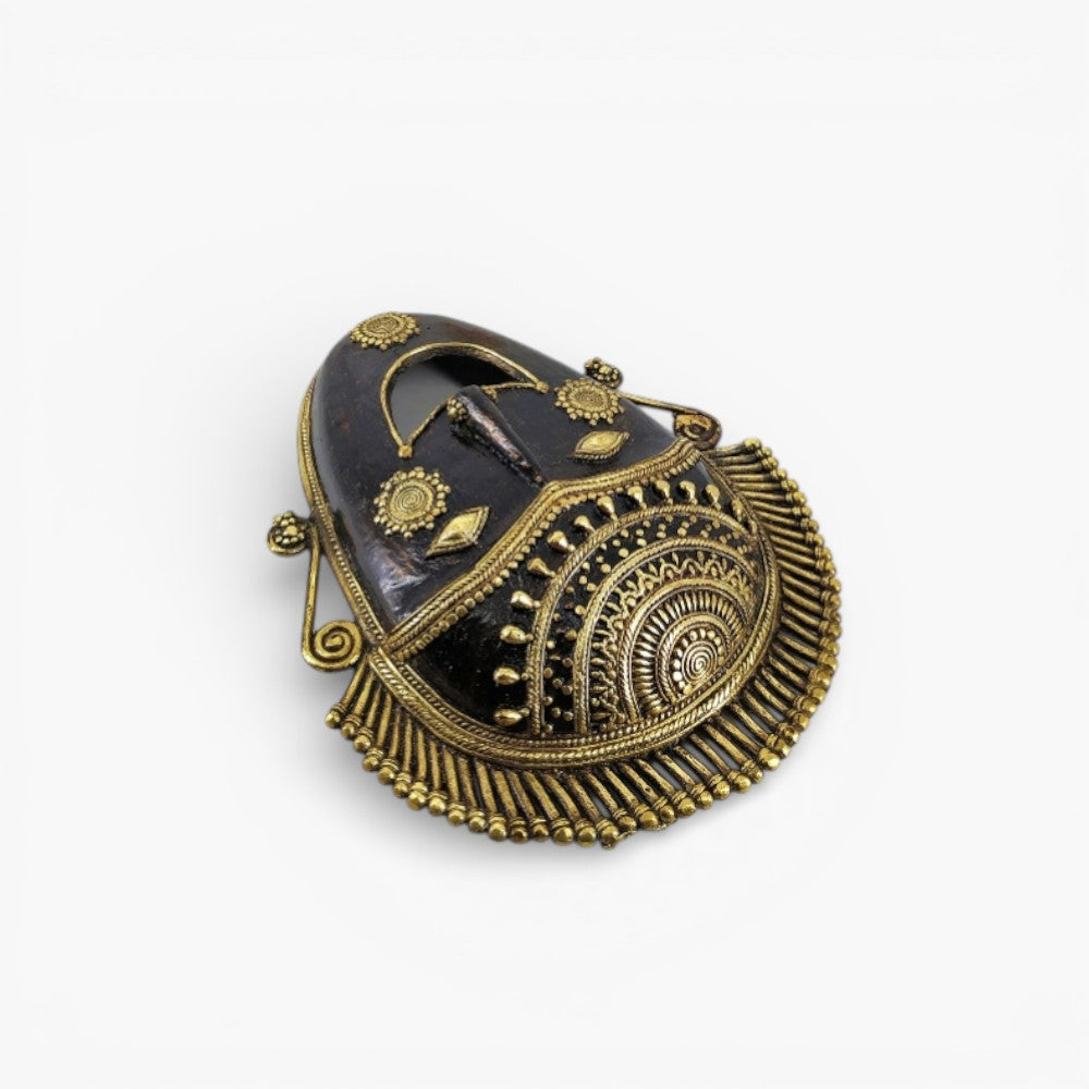 Traditional Bastar art ornamented brass mask wall decor with intricate handcrafted metal detailing