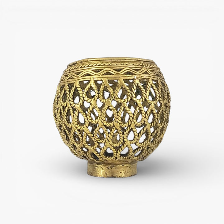 Studio front view of Dhokra art brass ornate pen holder with waterdrop inspired bulbous form