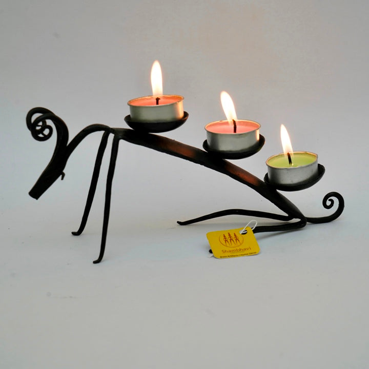 Artisan made iron lamb candle holder side angle