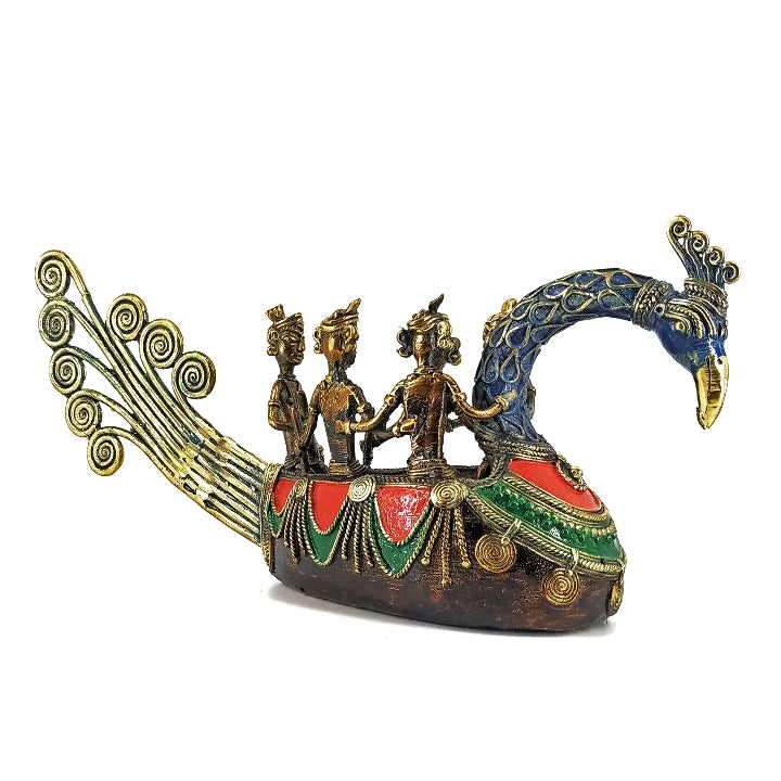 Handcrafted Bastar dhokra brass peacock boat statue captured in three quarter front angle highlighting multicolor patterns and sculpted details