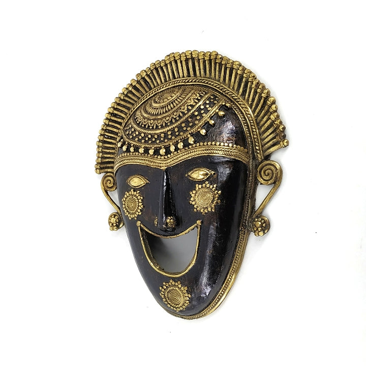 Handcrafted Bastar art ornamented brass mask in bronze finish showcasing intricate Dhokra detailing and traditional Indian design