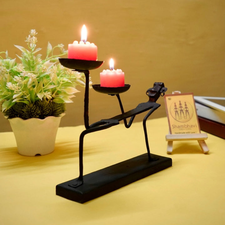 Side angle of handcrafted Bastar Dokra art iron candle holder