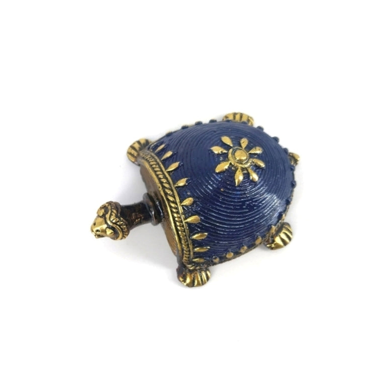 Handcrafted Dhokra art bell metal turtle figurine in blue color showing detailed shell pattern and traditional Bastar metal craftsmanship