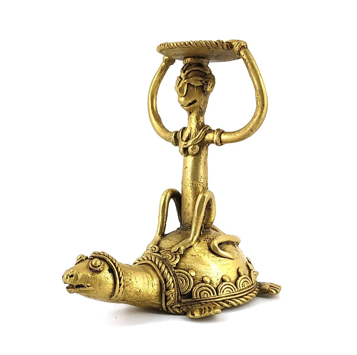 Side view of Bastar Dokra art brass candle holder