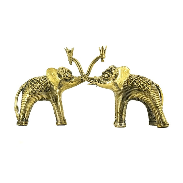 Handcrafted brass elephant duo with raised trunks facing each other, dhokra art decorative showpiece