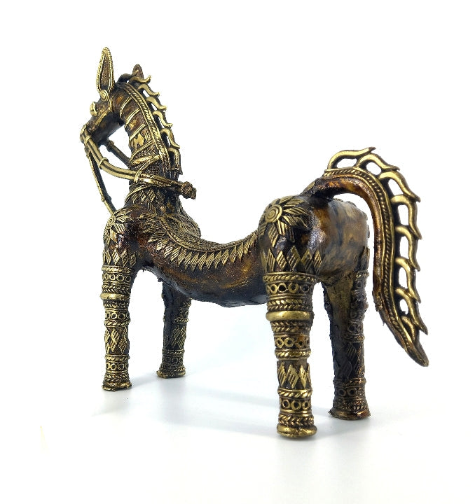 Back view of handcrafted brass horse statue with bent back highlighting symmetrical dhokra art motifs and sturdy leg form