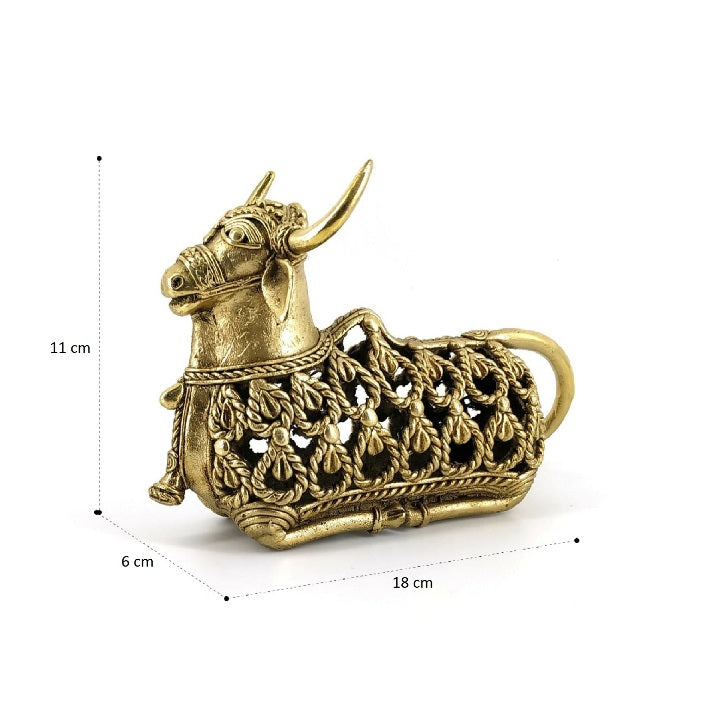 Angled view of brass Nandi sitting statue with ornate jali design highlighting size and handcrafted Dokra detailing