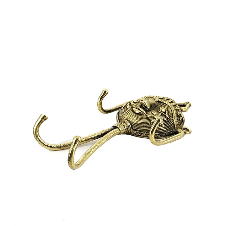 Golden brass handcrafted key holder with mask design
