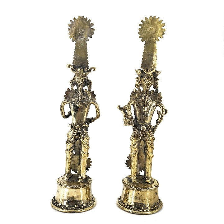Back view of handcrafted brass Jhitku Mitki tribal statues showcasing detailed Dokra metal casting and traditional ornamentation