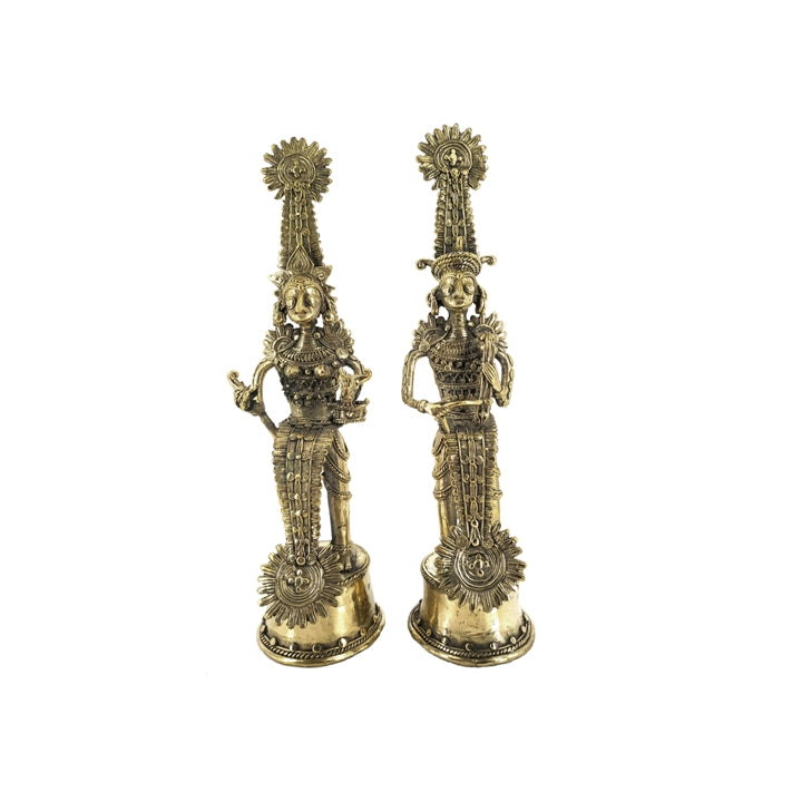 Complete pair of Jhitku Mitki brass tribal statues standing together representing Bastar folk love story in Dokra art