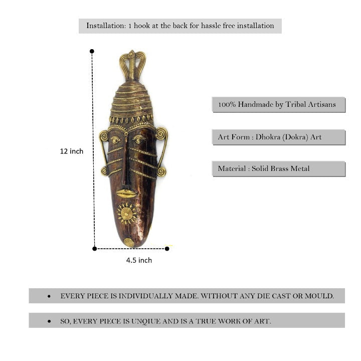 Front view of handcrafted long face tribal brass mask in bronze color showing 12 inch height and traditional Dhokra metal detailing