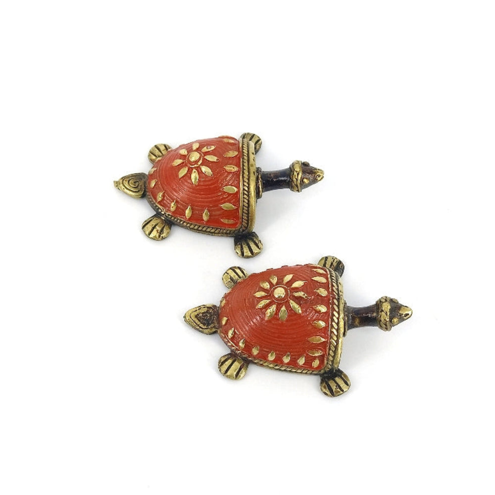 Red enamel brass tortoise figurine close-up detailing