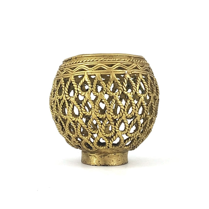 Studio front view of Dhokra art brass ornate pen holder with waterdrop inspired bulbous form