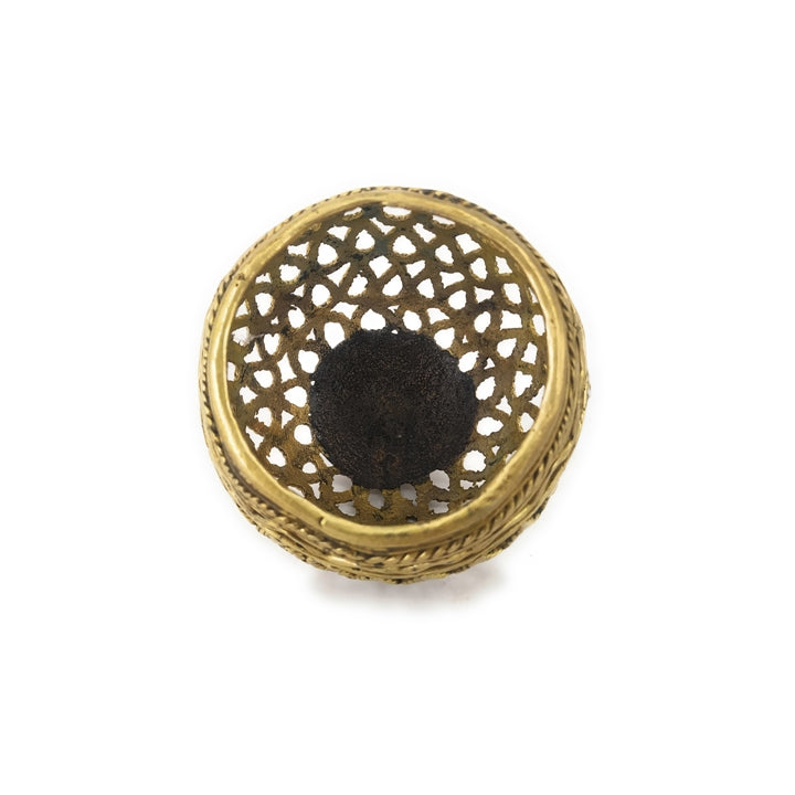 Top view of handcrafted brass bulbous pen holder highlighting open jali design and smooth inner base
